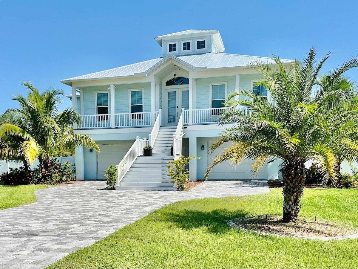 Seaside Boca bedroom with tropical inspired decor