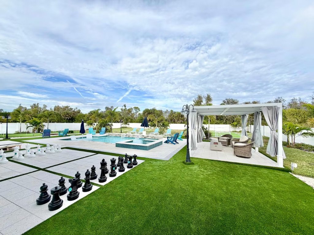 Seaside Boca resort pool with giant chess and cabana