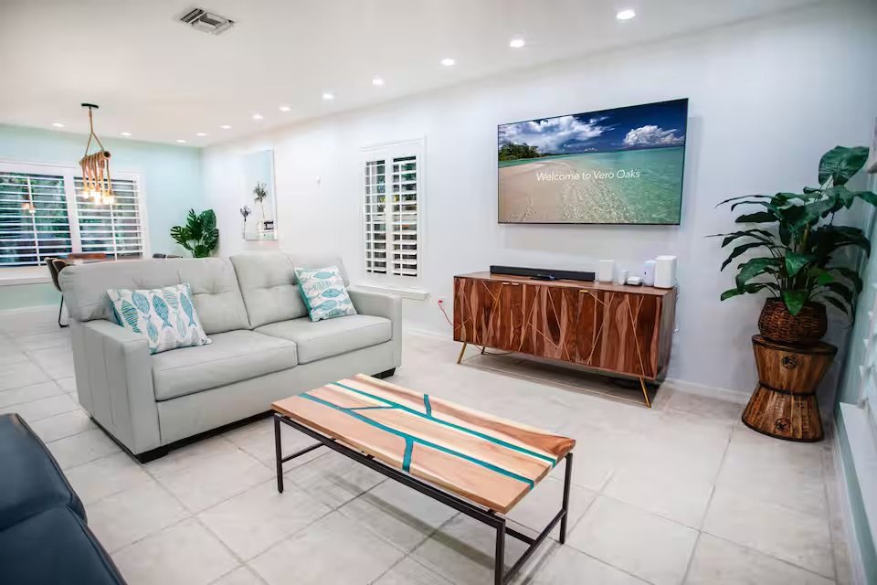 Vero Oaks modern living room with coastal decor flatscreen TV and stylish furniture