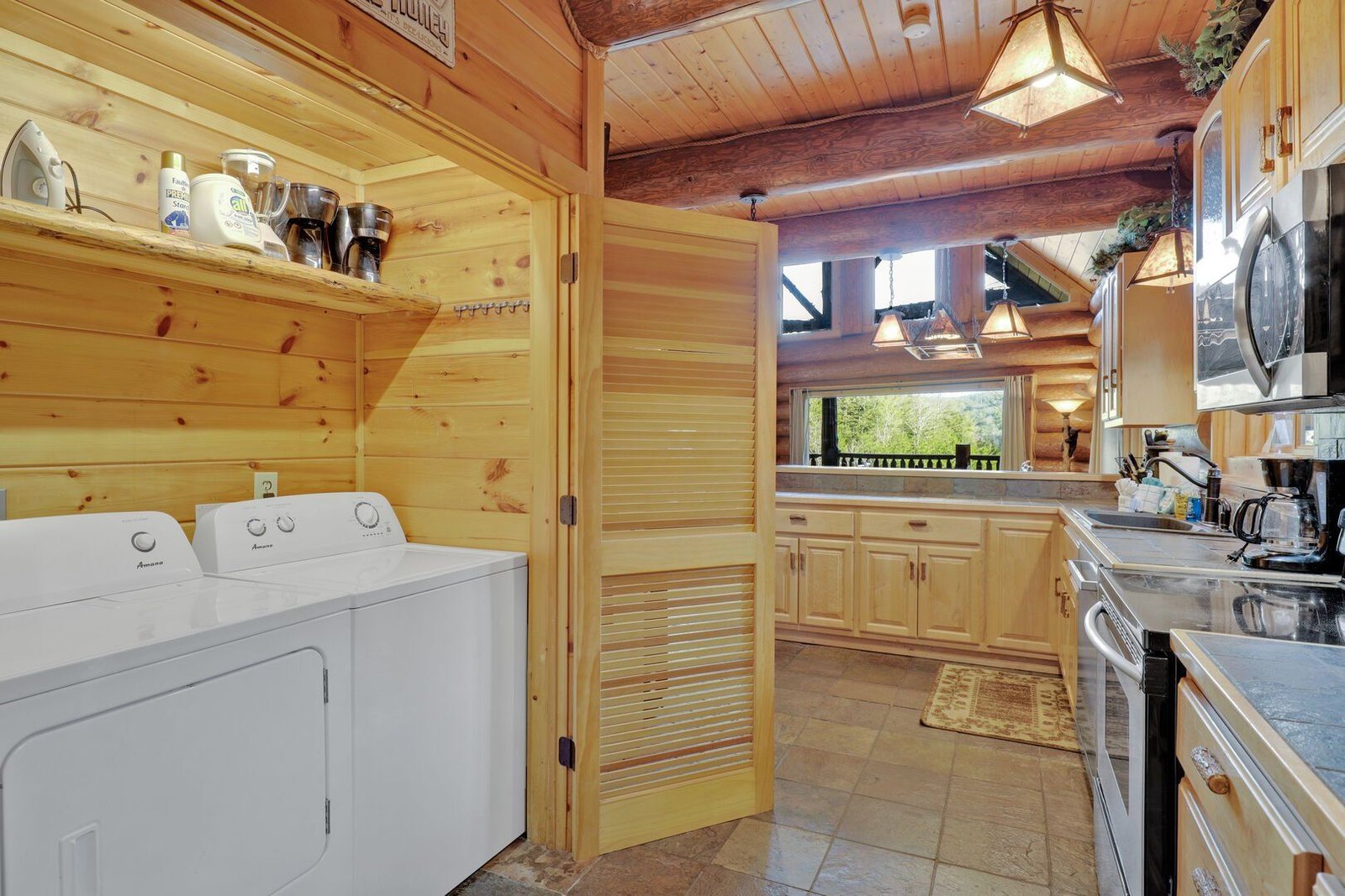 Waters Edge Lodge game loft with pool table and arcade